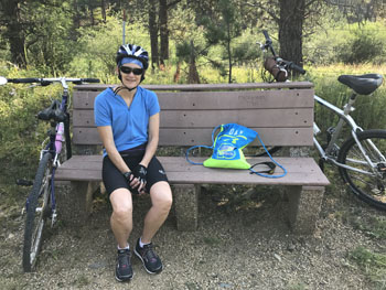 Sarah on bench biking